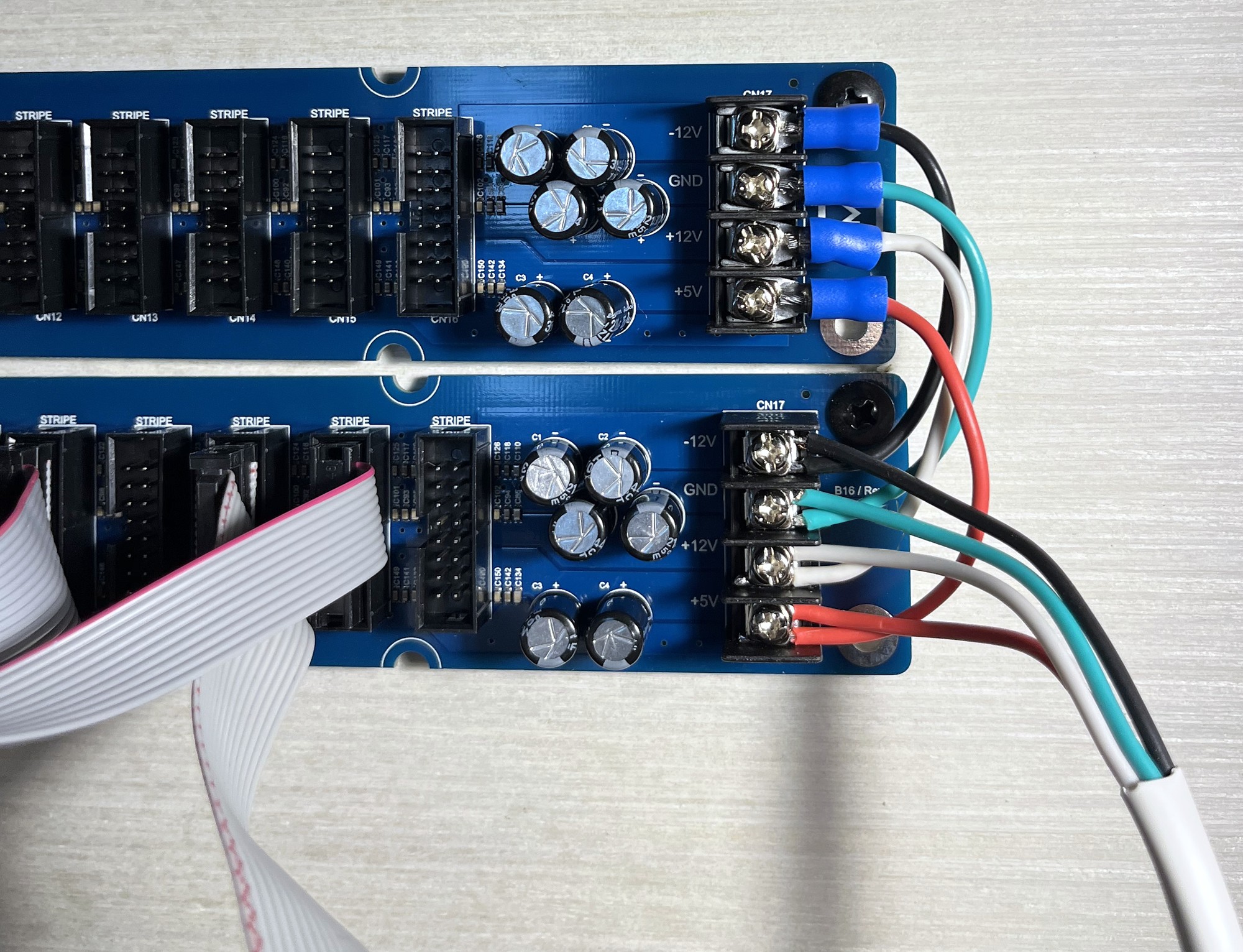 Two BD16 boards connected with spade-terminated power wiring